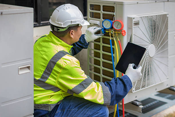 Professional Ac Installation technician working in Elmwood, MA